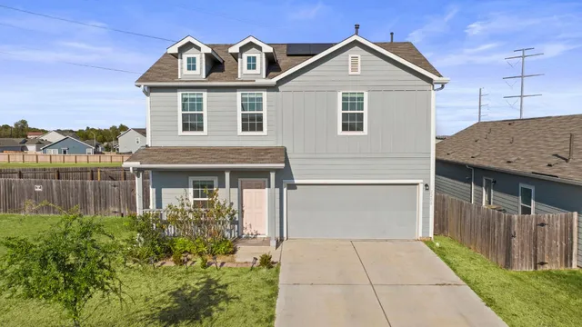 a view of outdoor space yard and front view of a house