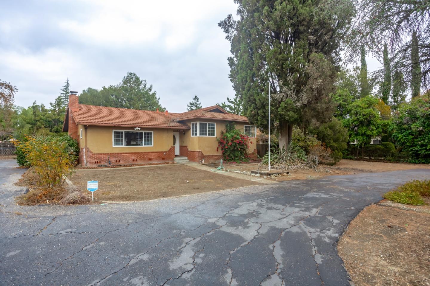 22381 McClellan Road Cupertino, CA 95014 - Photo 2 of 14 a view of a house with a yard and tree s