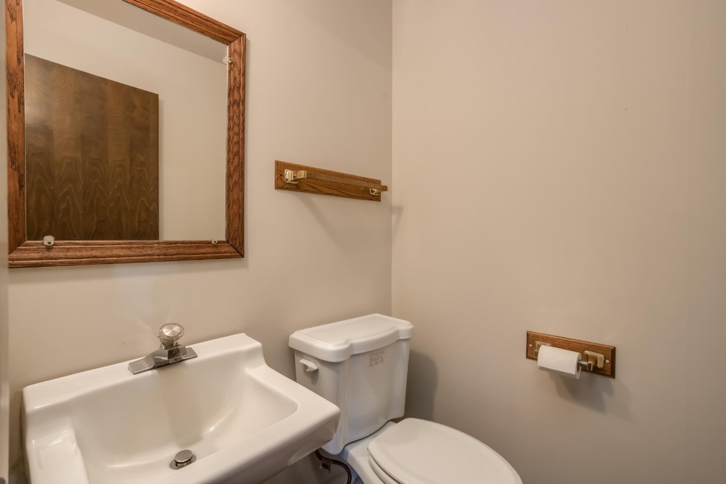 22381 McClellan Road Cupertino, CA 95014 - Photo 6 of 14 a bathroom with sink and mirror