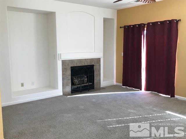 10575 Arbor Way Reno, NV 89521 - Photo 6 of 19 a view of empty room with a fireplace