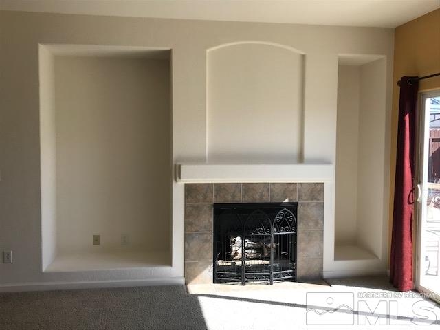 10575 Arbor Way Reno, NV 89521 - Photo 7 of 19 a living room with a fireplace