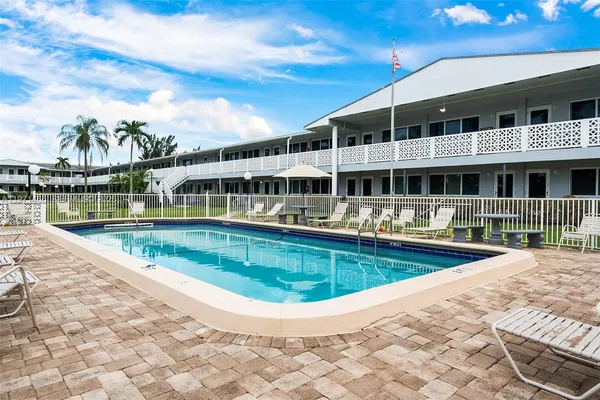 a view of a house with swimming pool