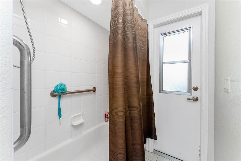 20 Long Meadow Place Rotonda West, FL 33947 - Photo 26 of 48 a bathroom with a shower and a sink