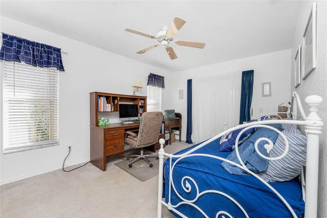 a utility room with sink dryer and washer