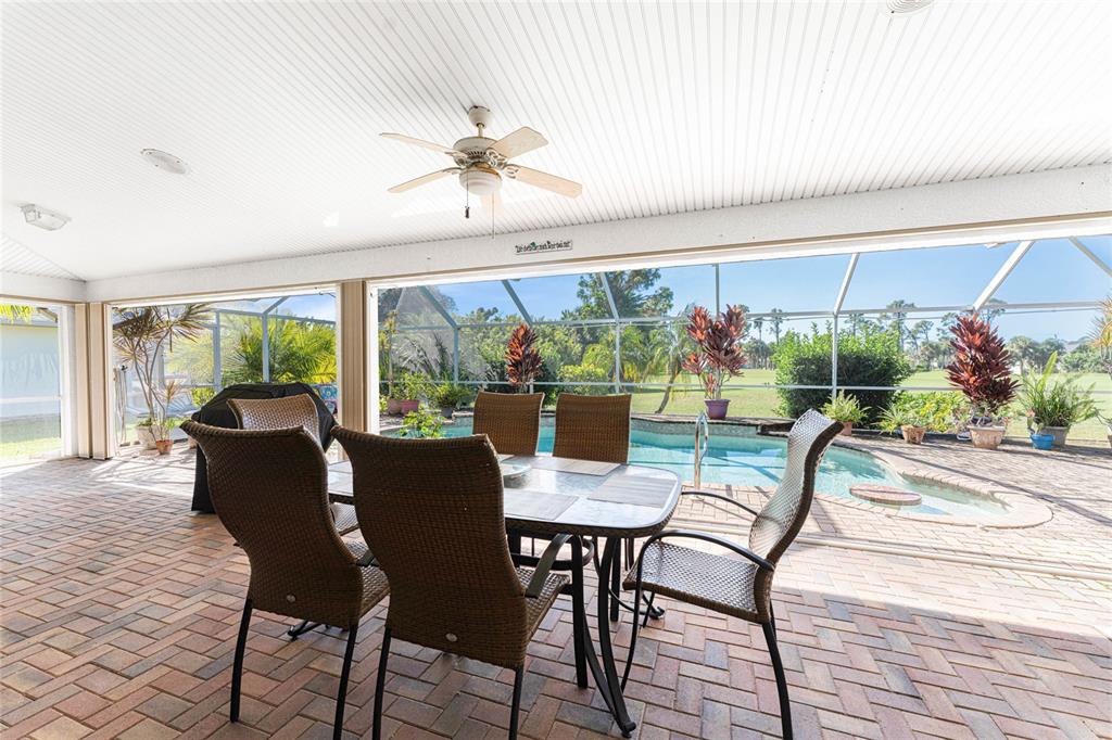 20 Long Meadow Place Rotonda West, FL 33947 - Photo 31 of 48 a view of a dining room with furniture window and outside view