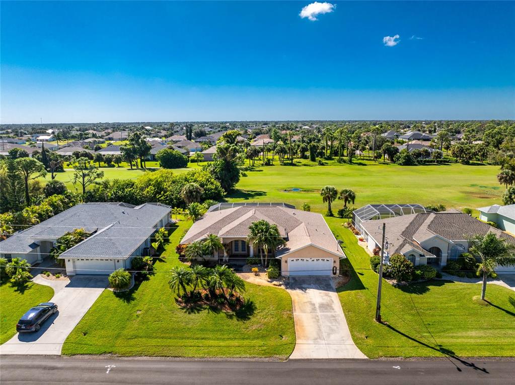 20 Long Meadow Place Rotonda West, FL 33947 - Photo 38 of 48 an aerial view of a house with a garden and swimming pool