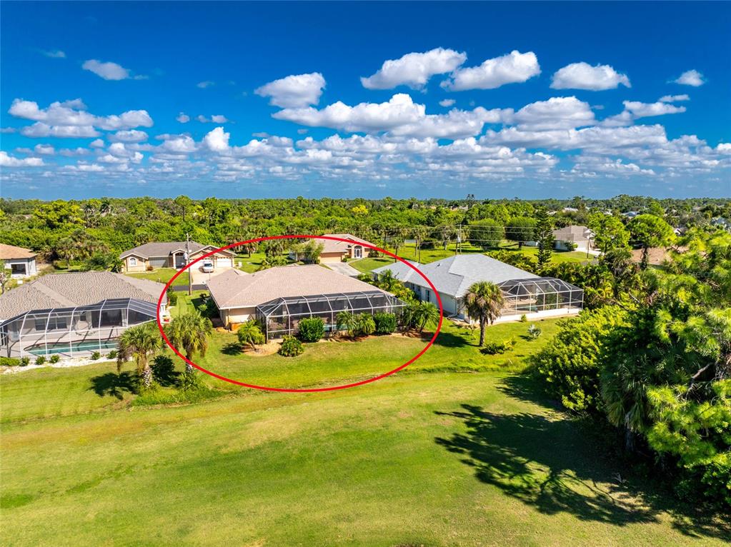 20 Long Meadow Place Rotonda West, FL 33947 - Photo 41 of 48 an aerial view of a house with a swimming pool yard and outdoor seating