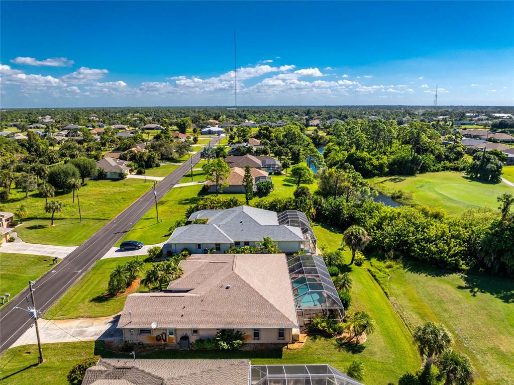 20 Long Meadow Place Rotonda West, FL 33947 - Photo 43 of 48 an aerial view of a house with a garden
