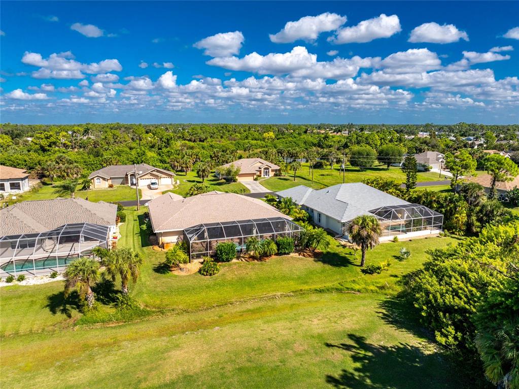 20 Long Meadow Place Rotonda West, FL 33947 - Photo 10 of 48 a view of an swimming pool with outdoor seating