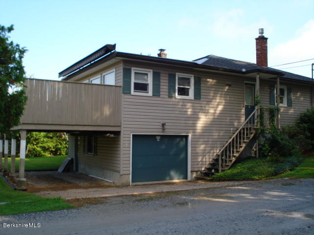 455 Pecks Road Pittsfield, MA 01201 - Photo 2 of 21 Side View with Garage and Deck