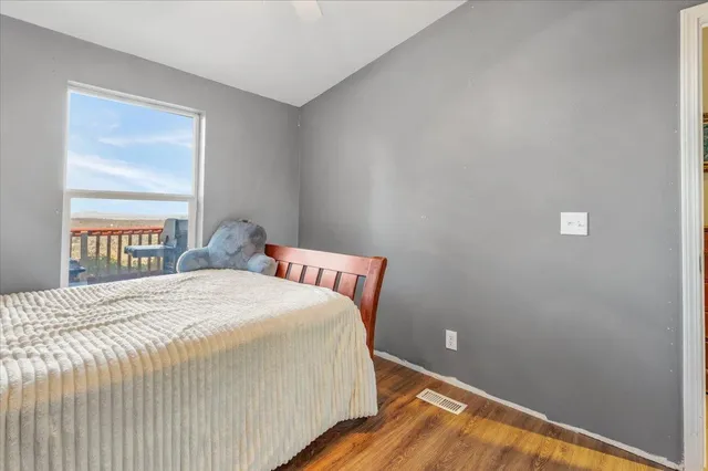 a view of a bedroom from a hallway