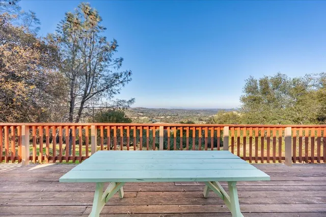 a view of deck with a patio