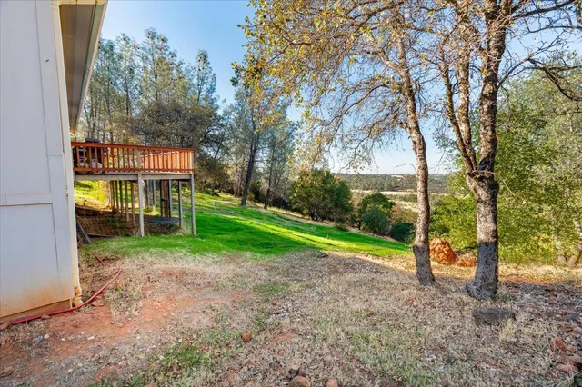 a view of a golf course with a lake