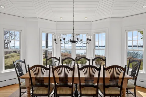 a spacious bedroom with a bed and a window