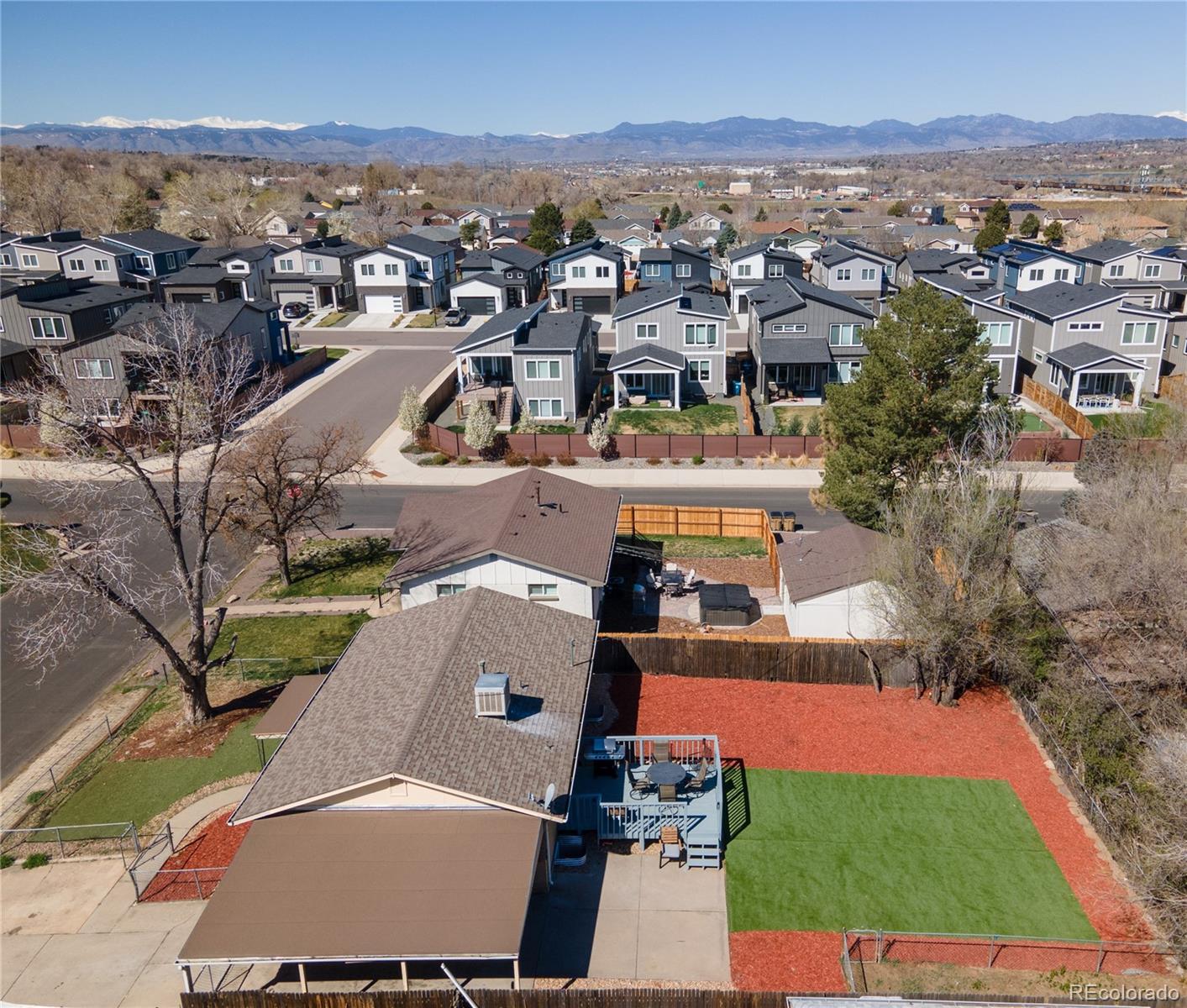 2361 West 57th Avenue Denver, CO 80221 - Photo 13 of 15 an aerial view of residential houses with outdoor space and trees