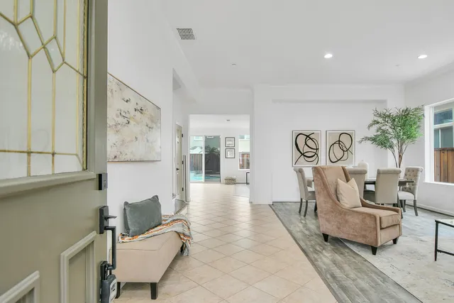 a living room with furniture and a table