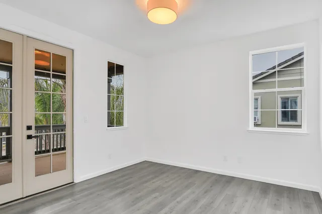 an empty room with windows