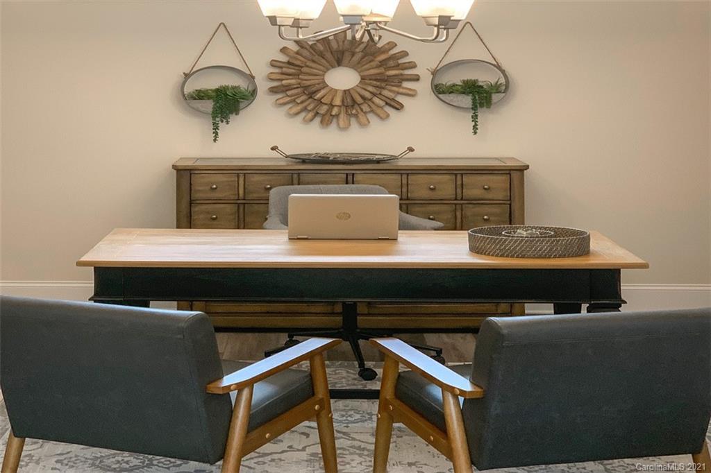 2064 New Style Way, Unit 40 Tega Cay, SC 29708 - Photo 12 of 16 a view of table with chairs