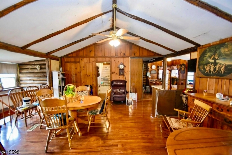 21 Grandview Avenue Oak Ridge, NJ 07438 - Photo 2 of 7 a view of a dining room with furniture window and wooden floor