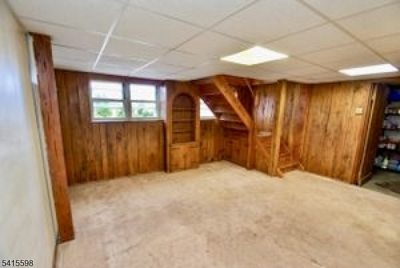 21 Grandview Avenue Oak Ridge, NJ 07438 - Photo 6 of 7 an empty room with windows