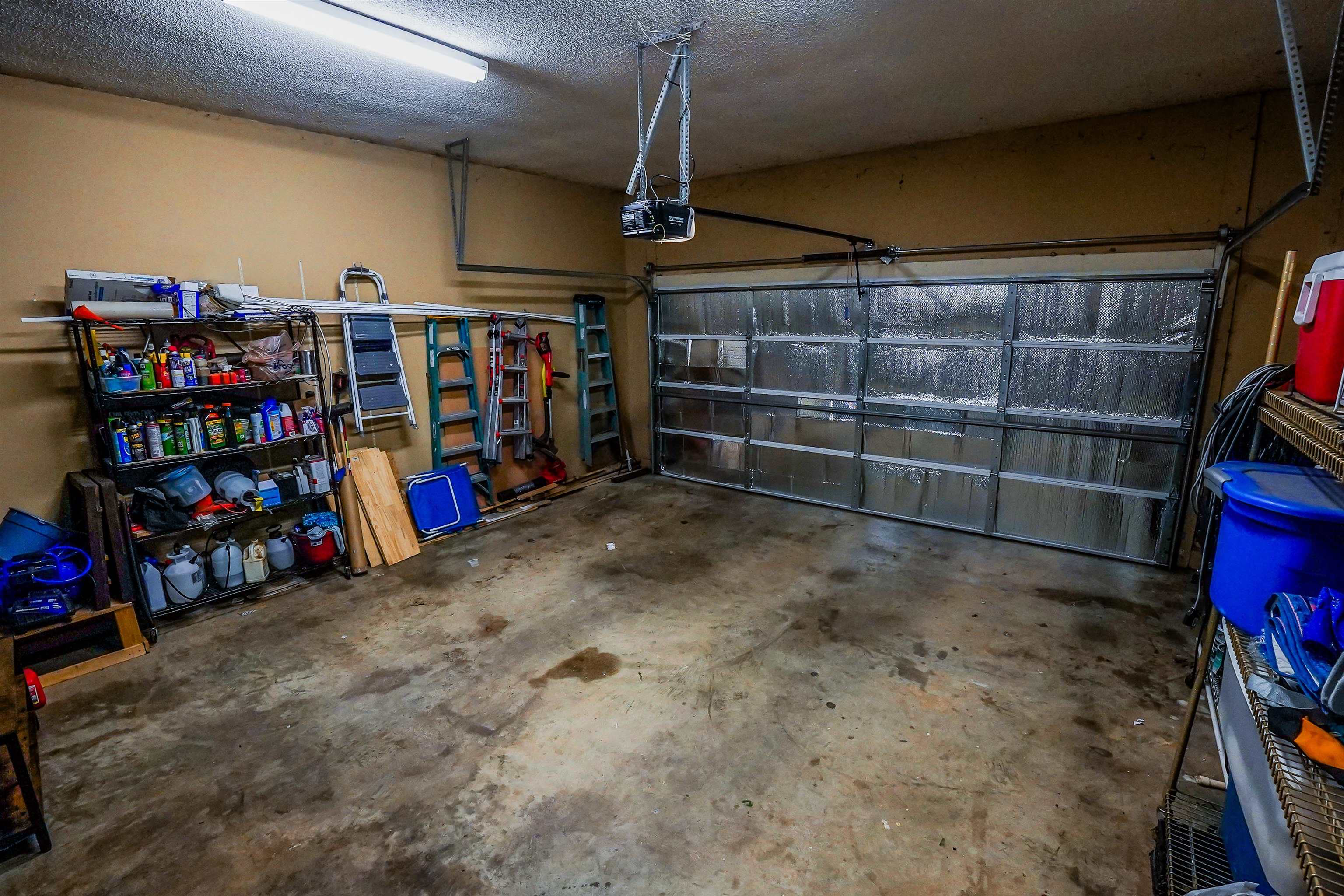 1336 Mathis Road Drummonds, TN 38023 - Photo 18 of 21 Garage featuring a garage door opener