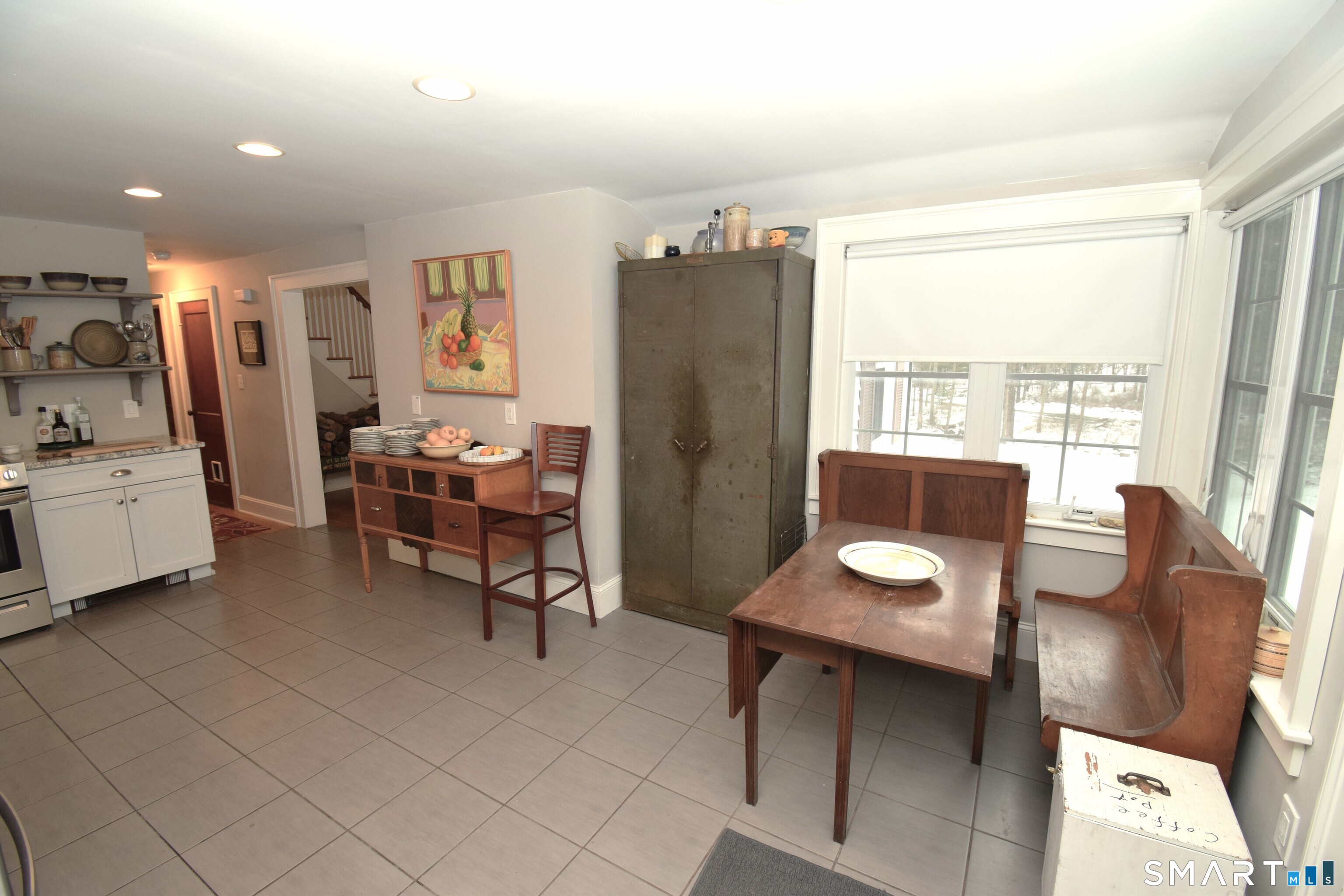 2203 Durham Road Madison, CT 06443 - Photo 7 of 17 a living room with furniture and a window