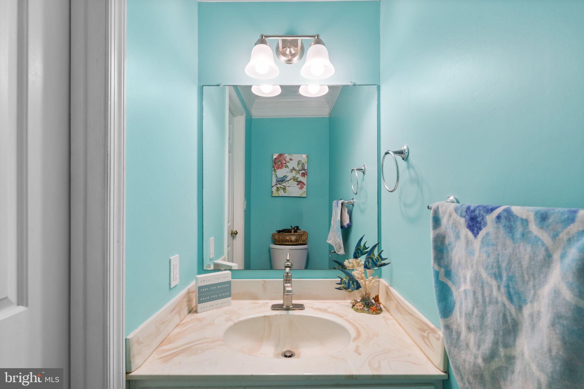 1043 Windrush Lane, Unit 5 Sandy Spring, MD 20860 - Photo 15 of 28 a bathroom with a sink and a mirror