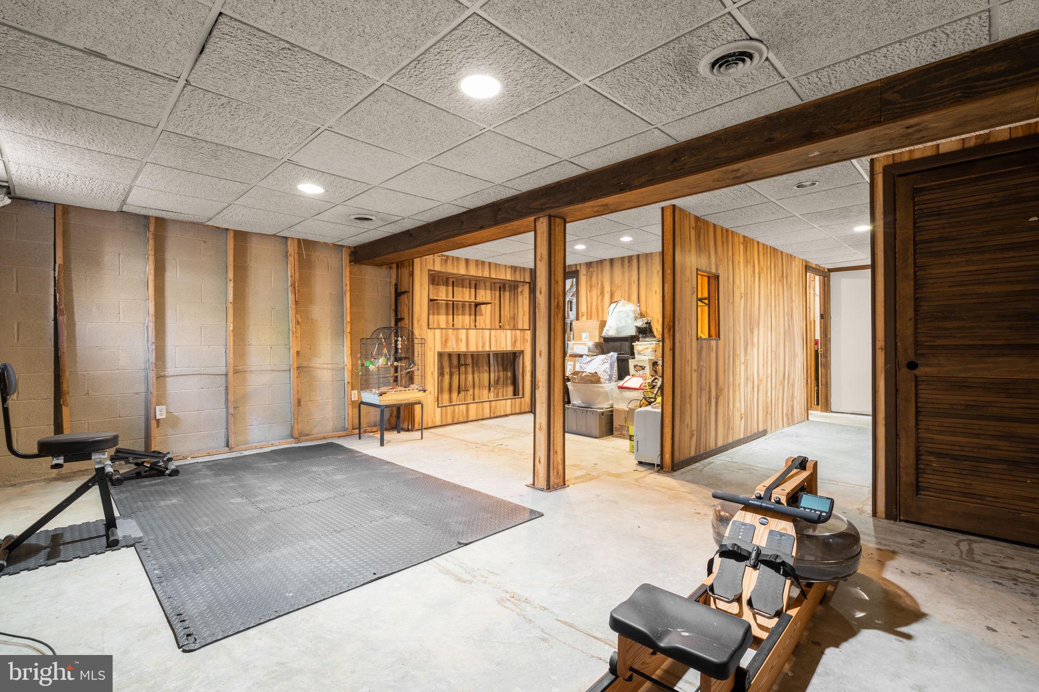 1043 Windrush Lane, Unit 5 Sandy Spring, MD 20860 - Photo 24 of 28 a view of a room with gym equipment