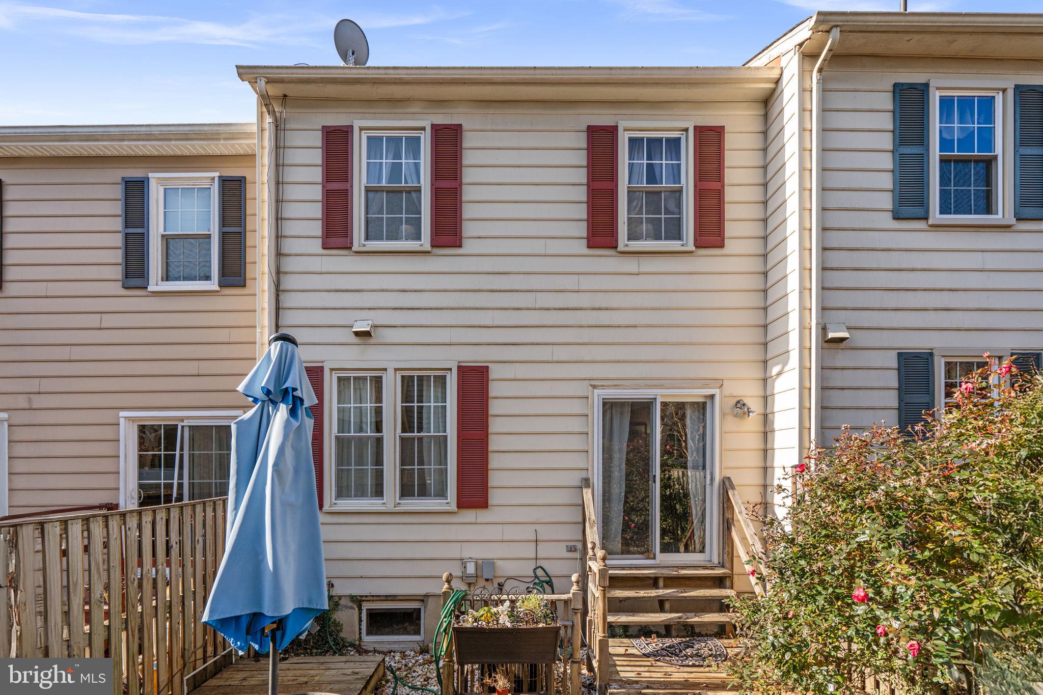 1043 Windrush Lane, Unit 5 Sandy Spring, MD 20860 - Photo 26 of 28 a view of a house with more windows and brick walls