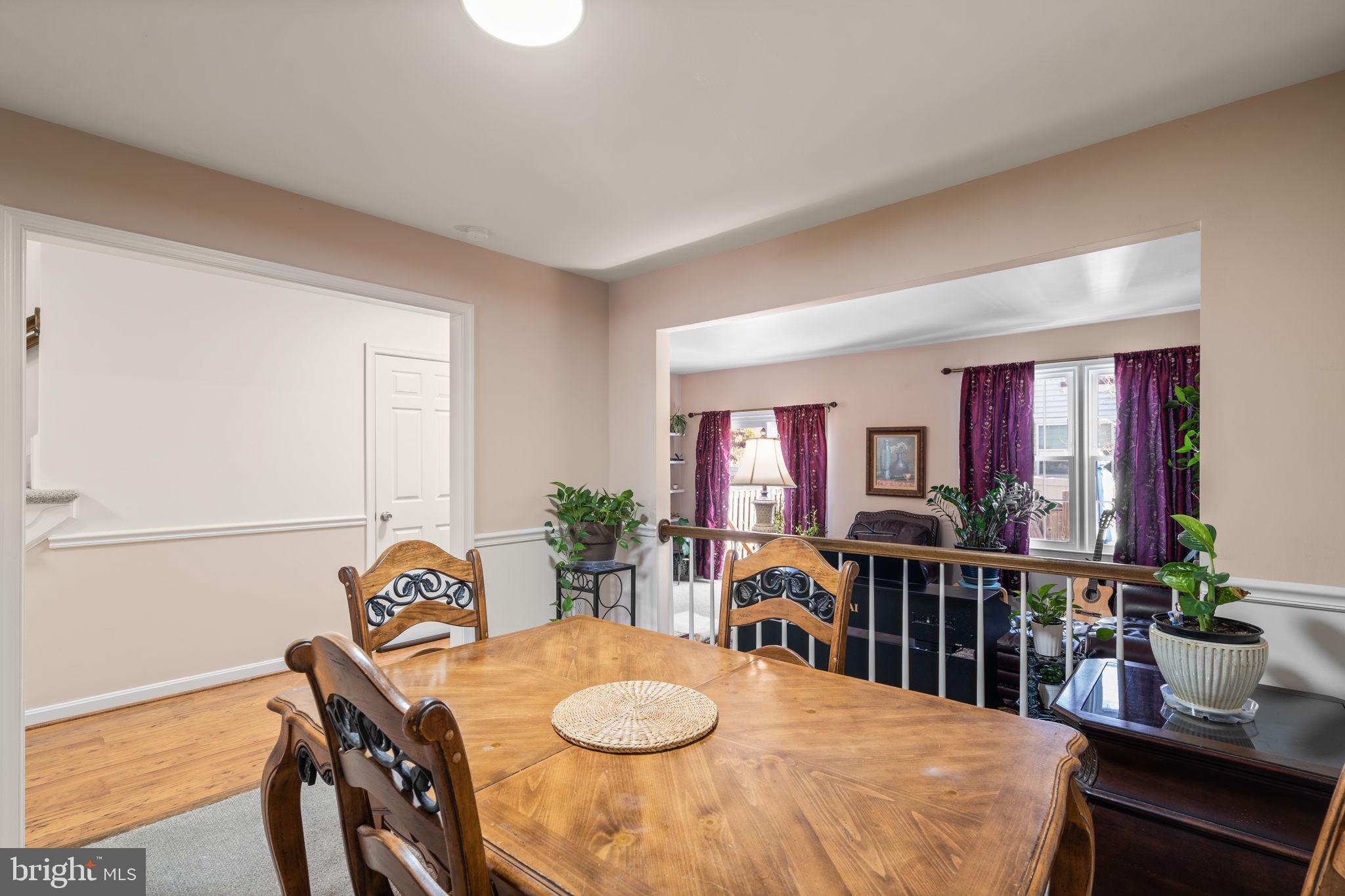 1043 Windrush Lane, Unit 5 Sandy Spring, MD 20860 - Photo 8 of 28 a view of a dining room with furniture