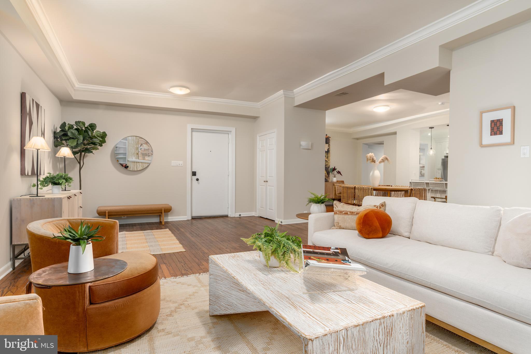 2230 California Street Northwest, Unit 3BE Washington, DC 20008 - Photo 11 of 49 a living room with furniture and a large window