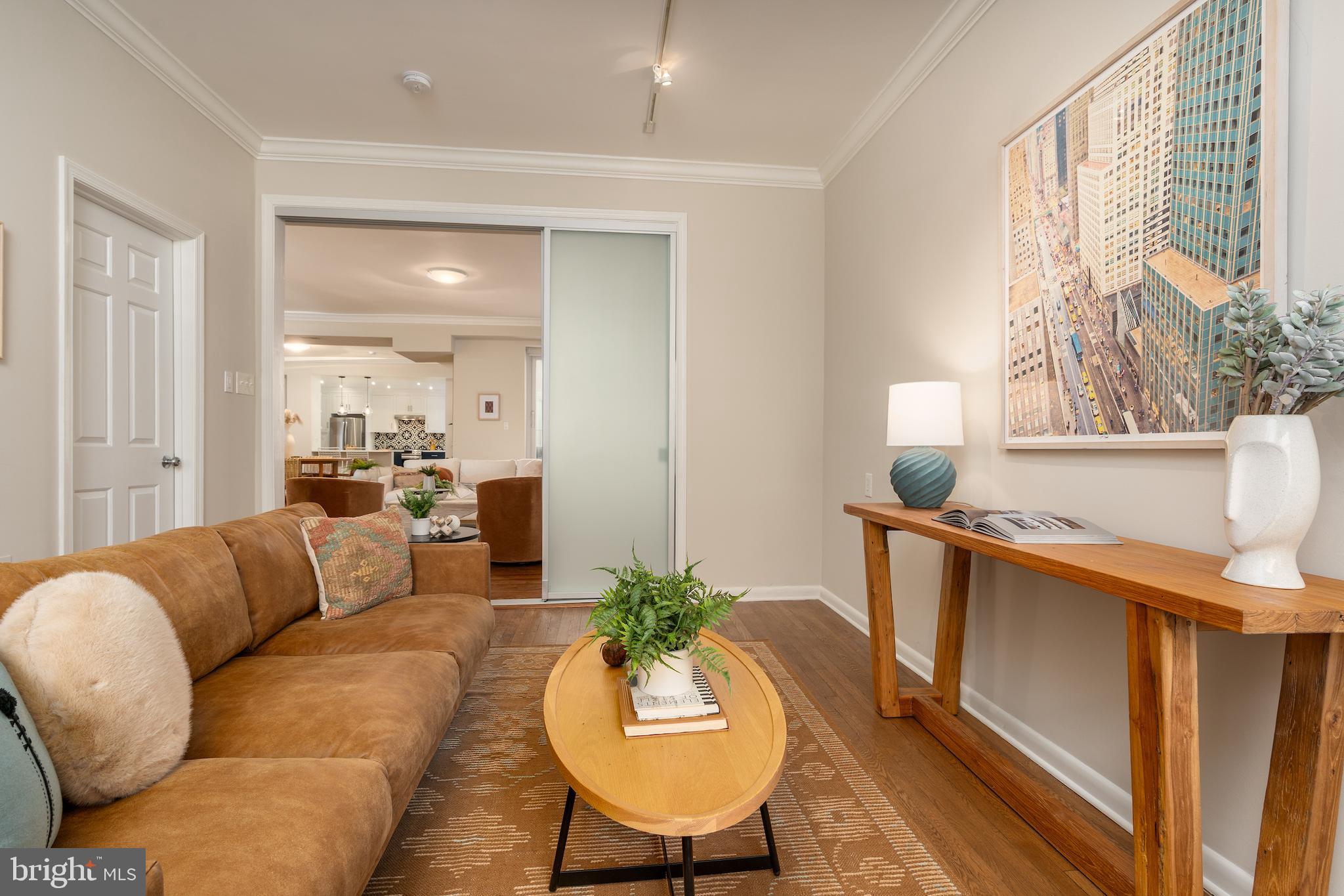 2230 California Street Northwest, Unit 3BE Washington, DC 20008 - Photo 15 of 49 a living room with furniture and a large window