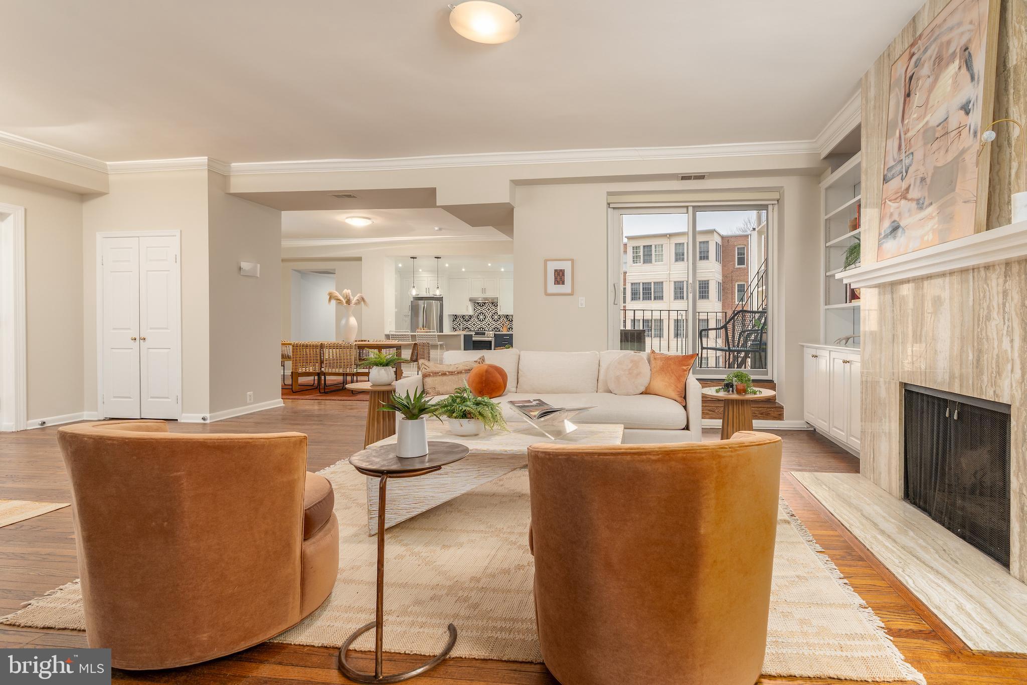 2230 California Street Northwest, Unit 3BE Washington, DC 20008 - Photo 18 of 49 a living room with fireplace furniture and a rug