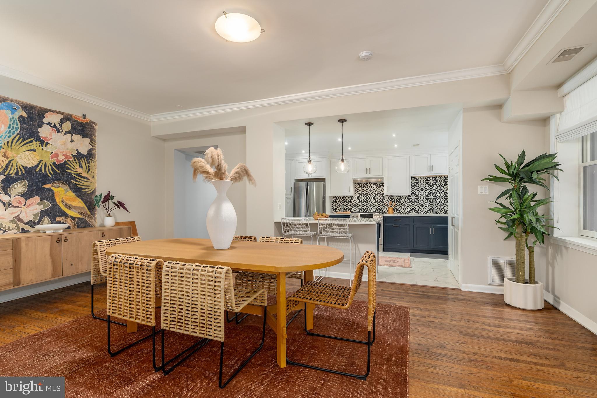 2230 California Street Northwest, Unit 3BE Washington, DC 20008 - Photo 19 of 49 a dining room with furniture and wooden floor