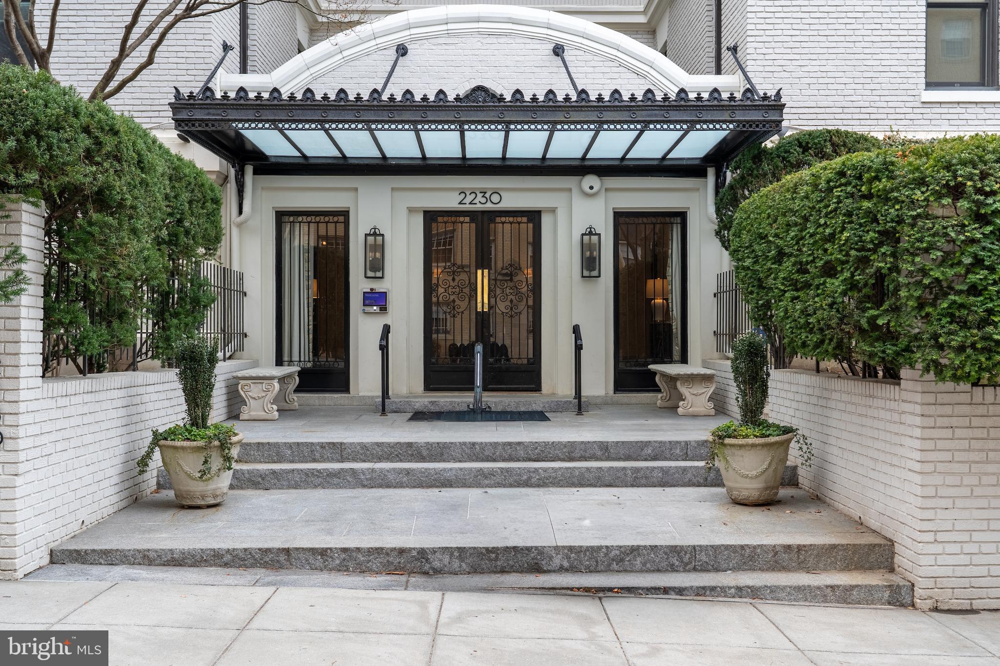 2230 California Street Northwest, Unit 3BE Washington, DC 20008 - Photo 2 of 49 a front view of a house with a porch