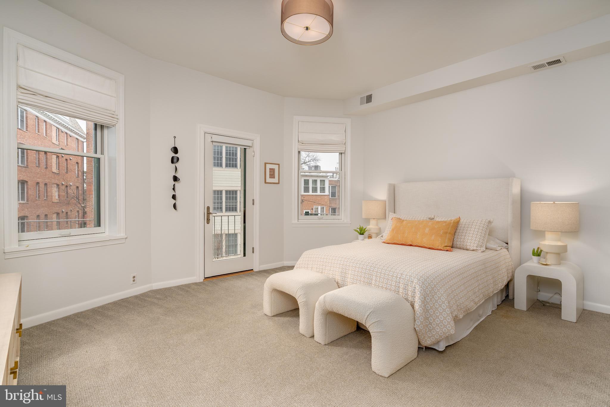 2230 California Street Northwest, Unit 3BE Washington, DC 20008 - Photo 27 of 49 a bedroom with a bed and window