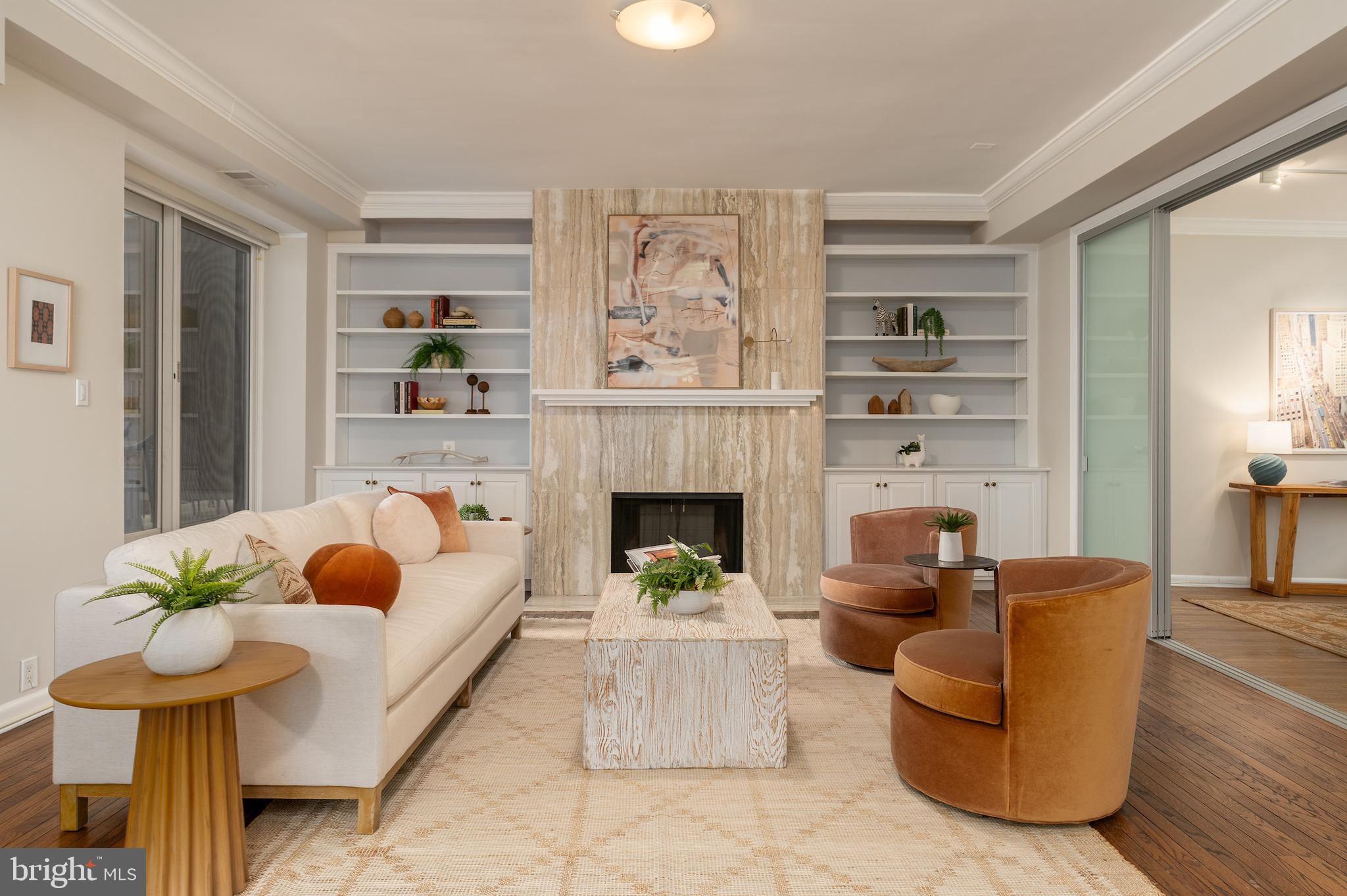 2230 California Street Northwest, Unit 3BE Washington, DC 20008 - Photo 3 of 49 a living room with furniture and a fireplace
