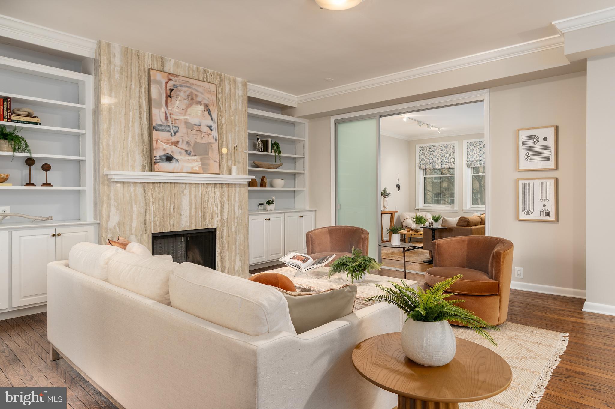 2230 California Street Northwest, Unit 3BE Washington, DC 20008 - Photo 4 of 49 a living room with furniture flowerpot and window