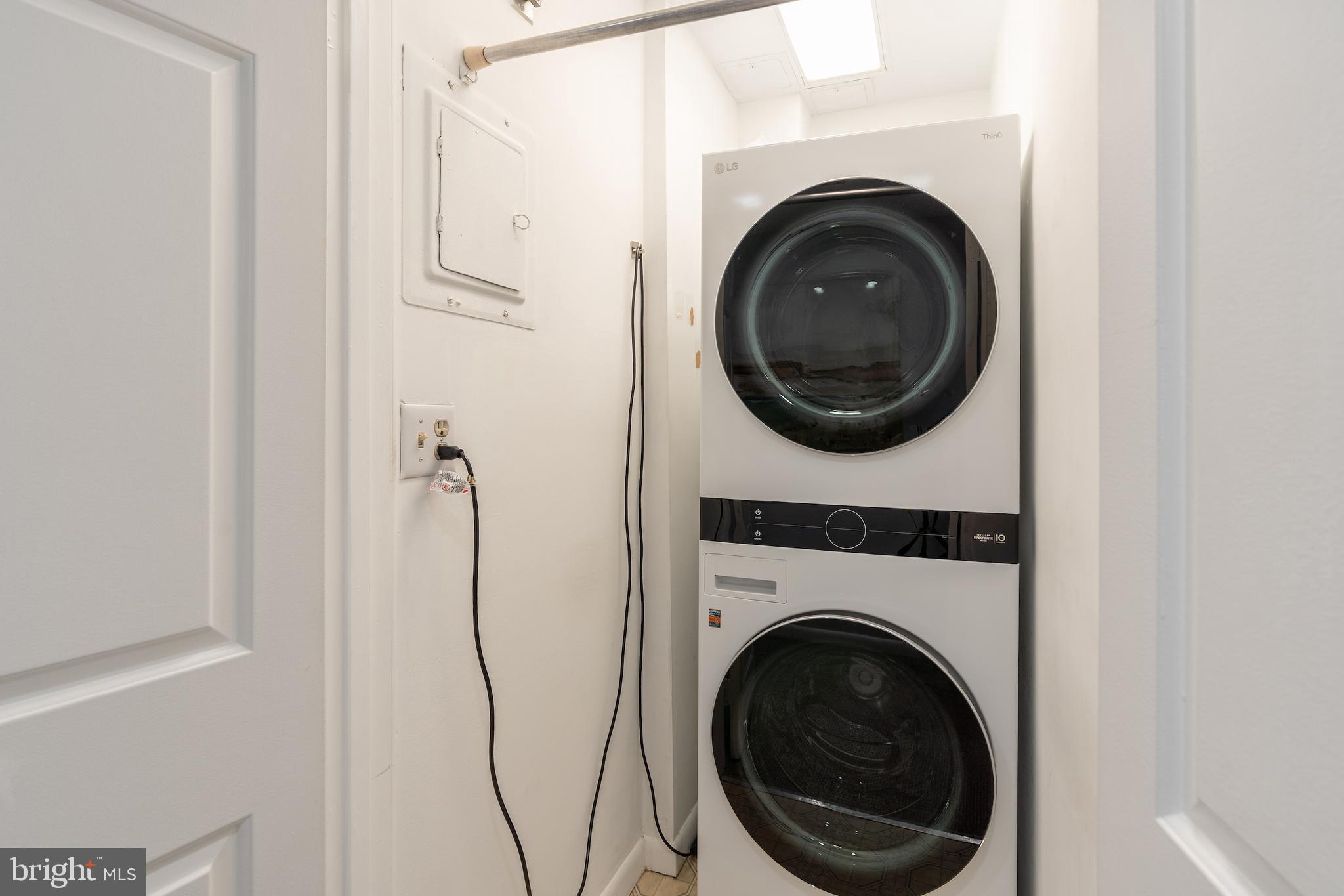 2230 California Street Northwest, Unit 3BE Washington, DC 20008 - Photo 44 of 49 a utility room with dryer and washer
