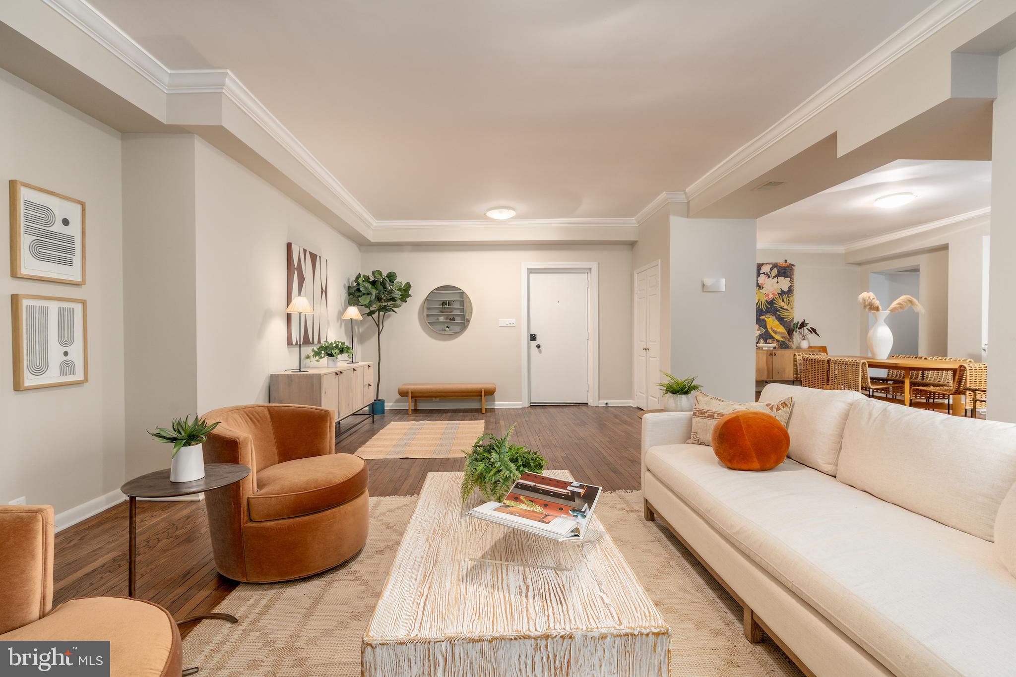 2230 California Street Northwest, Unit 3BE Washington, DC 20008 - Photo 10 of 49 a living room with furniture and a rug