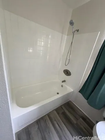 a bathroom with a bathtub