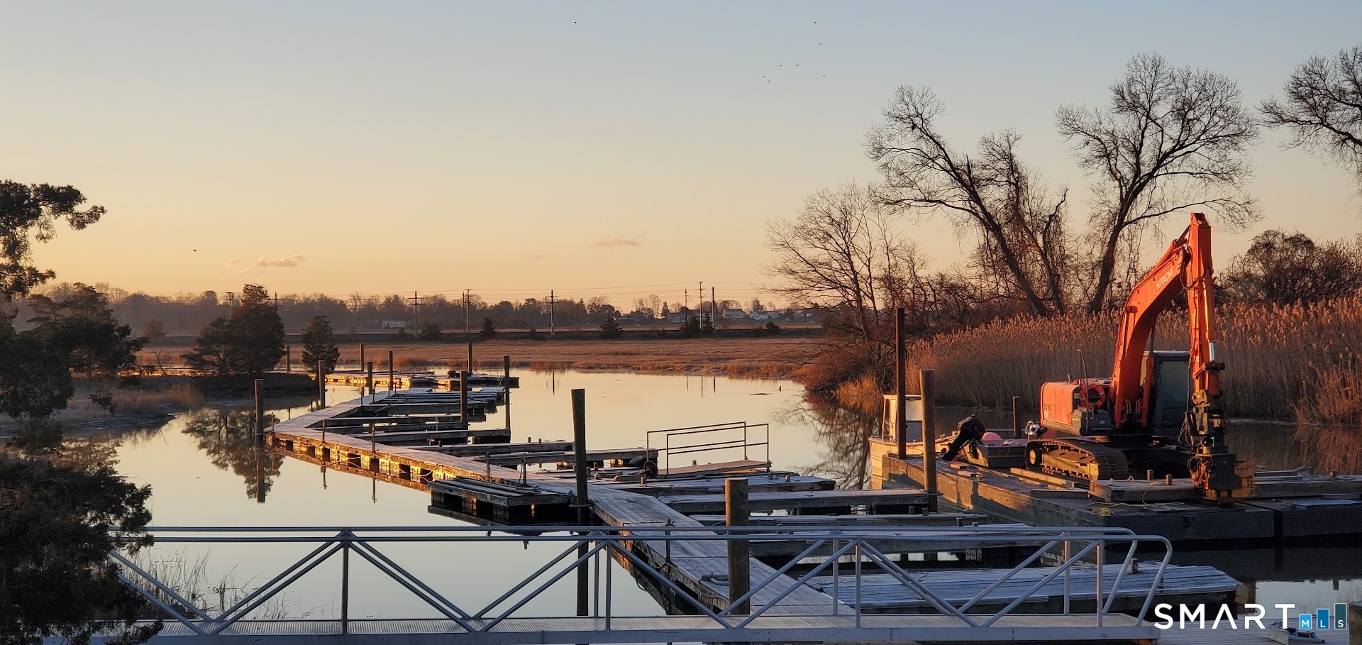 4 Boston Post Road Madison, CT 06443 - Photo 15 of 31 a view of a chairs and table on the terrace