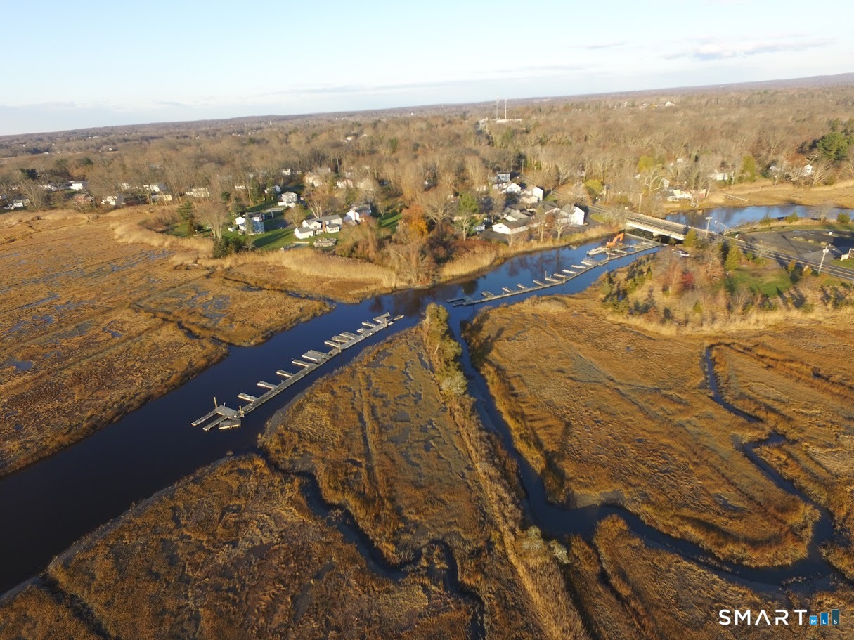 4 Boston Post Road Madison, CT 06443 - Photo 17 of 31 an aerial view of residential houses with outdoor space
