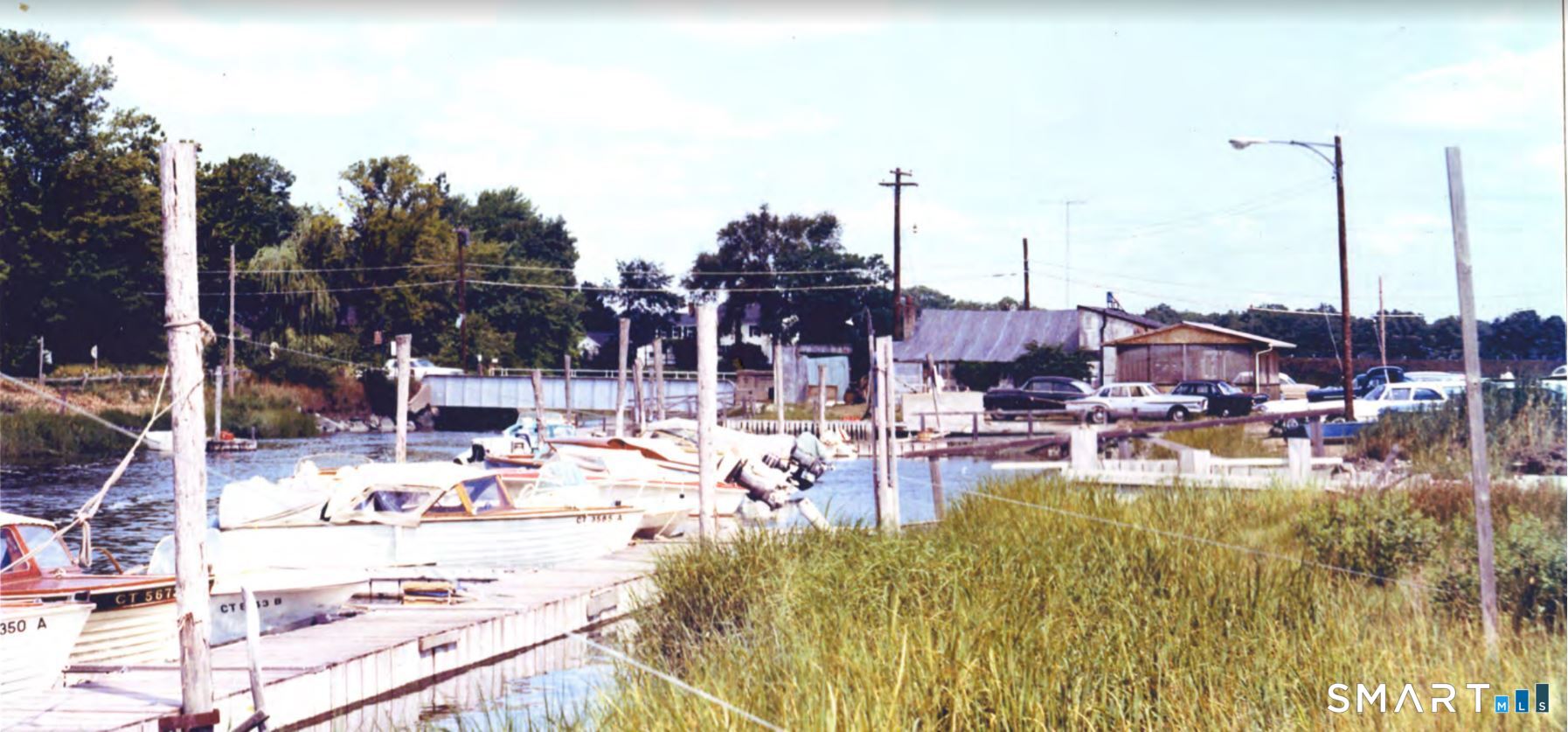 4 Boston Post Road Madison, CT 06443 - Photo 19 of 31 a view of a lake with boats