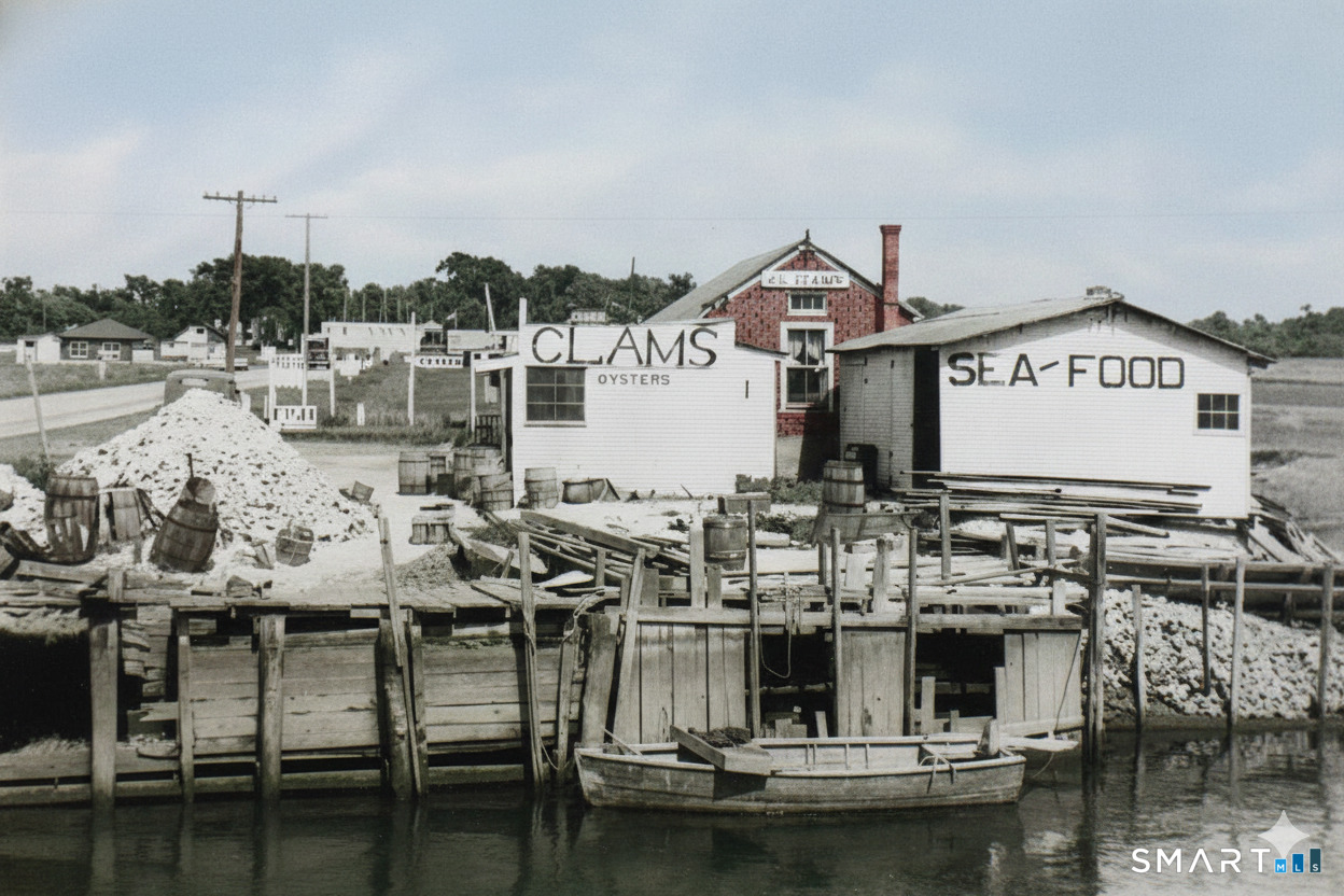 4 Boston Post Road Madison, CT 06443 - Photo 22 of 31 a view of a lake with lawn chairs