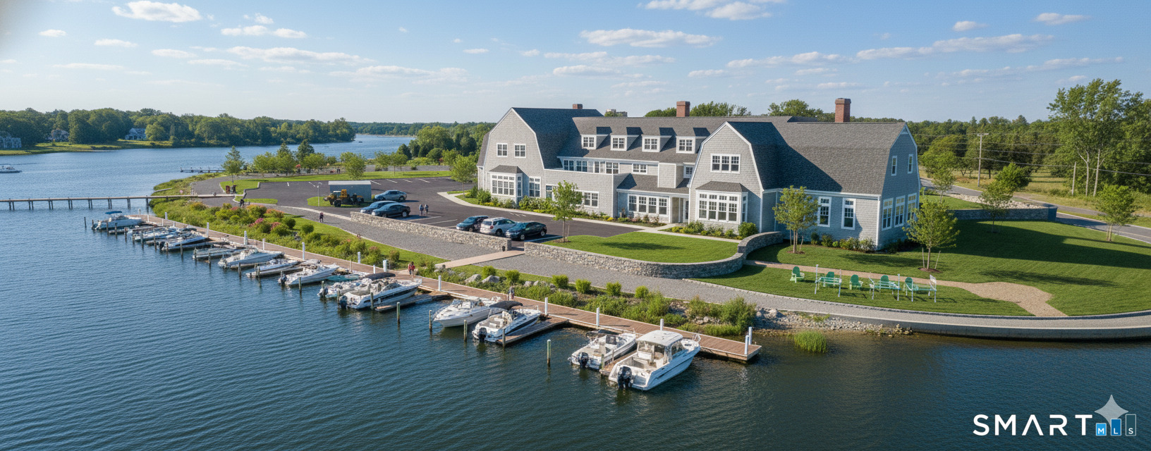 4 Boston Post Road Madison, CT 06443 - Photo 31 of 31 an aerial view of a house with swimming pool and lake view