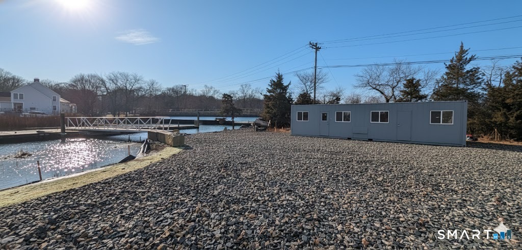 4 Boston Post Road Madison, CT 06443 - Photo 6 of 31 a view of a house with a yard