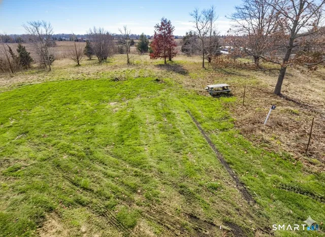 a view of a garden from a balcony