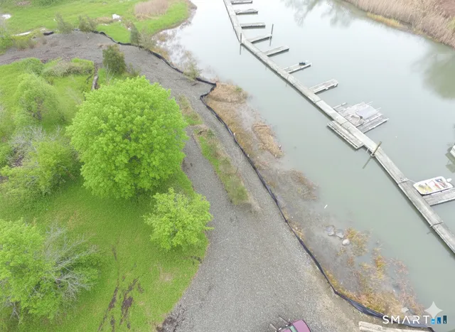 a view of a lake view with a big yard