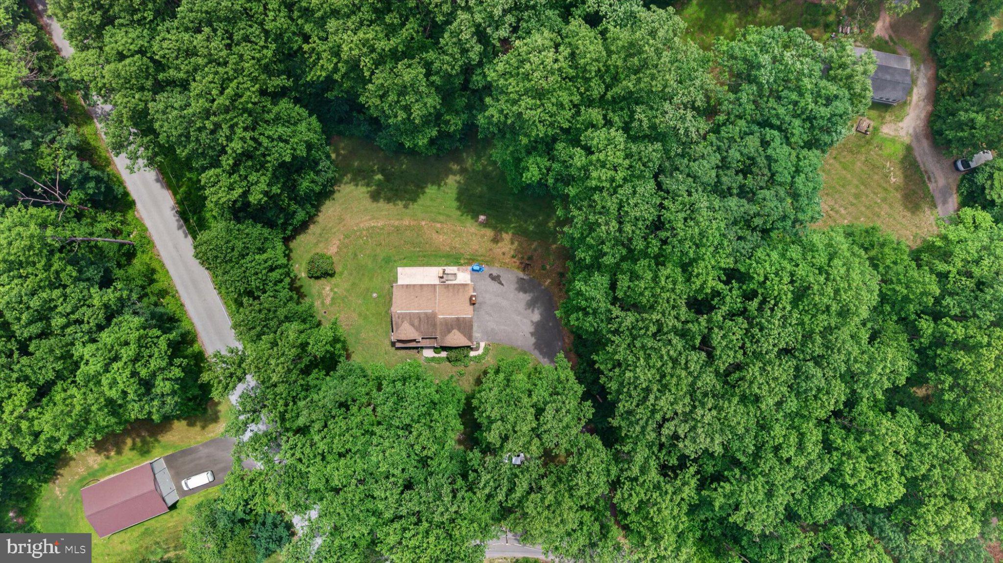 802 Hollow Road Delta, PA 17314 - Photo 35 of 45 Secluded home embraced by lush greenery.